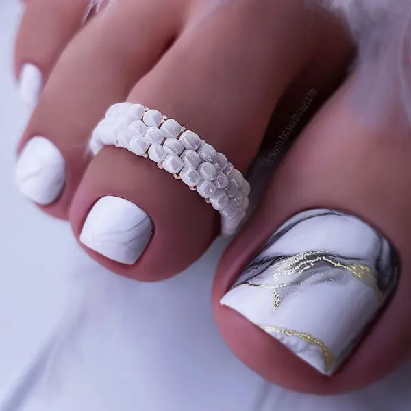 Marble effect toe nail designs